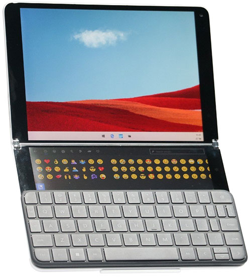 Устройство с двумя экранами накладной клавиатурой и Wonder bar